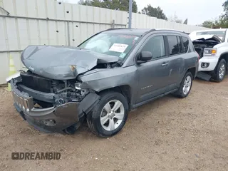 2012 Jeep Compass Sport with VIN 1C4NJCBB7CD664599, listed as a IAAI auction lot 41180829 with 144,909 mi miles. Bid and sale history available at carsss.com. Image 2.