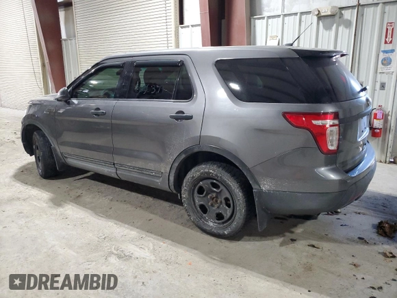 2015 Ford Utility Police Interceptor with VIN 1FM5K8ARXFGB75590, listed as a Copart auction lot 86499964 with 122,637 mi miles and Salvage Title. Bid and sale history available at carsss.com. Image 2.