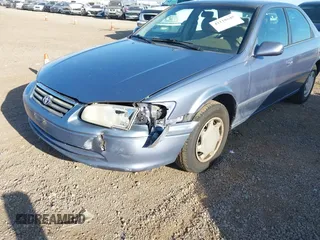 2000 Toyota Camry CE with VIN 4T1BG22K6YU000857, listed as a IAAI auction lot 42118645 with 244,448 mi miles and . Bid and sale history available at carsss.com. Image 6.