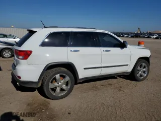 2013 Jeep Grand Cherokee Limited with VIN 1C4RJFBG3DC511420, listed as a Copart auction lot 54760324 with 199,040 mi miles and Clean Title. Bid and sale history available at carsss.com. Image 3.