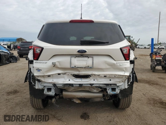 2019 Ford Escape Titanium with VIN 1FMCU0J91KUB19987, listed as a Copart auction lot 53946025 with 90,092 mi miles and Salvage title. Bid and sale history available at DreamBid. Image 6.