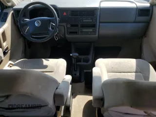 2003 Volkswagen EuroVan с VIN WV2KB47043H001319, выставлен на аукционе Copart как лот 73758024 с пробегом 88 497 миль миль и Чистый • Clean title. История ставок и продаж доступна на DreamBid. Изображение 8.