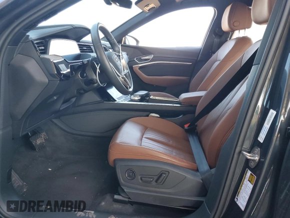 2023 Audi e-tron Premium with VIN WA1AAAGE3PB023323, listed as a Copart auction lot 69809524 with 31,564 mi miles and Salvage Title. Bid and sale history available at DreamBid. Image 7.