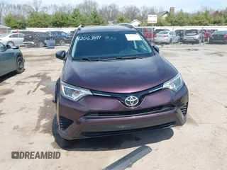 2016 Toyota RAV4 LE with VIN 2T3ZFREV8GW310580, listed as a IAAI auction lot 42063071 with 104,099 mi miles and . Bid and sale history available at DreamBid. Image 1.