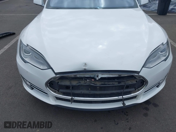 2016 Tesla Model S 90D with VIN 5YJSA1E21GF121962, listed as a IAAI auction lot 42130291 with 114,670 mi miles and . Bid and sale history available at DreamBid. Image 6.