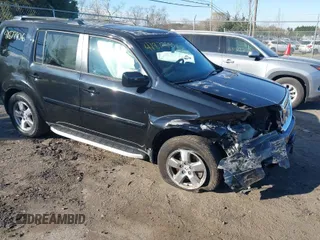 2011 Honda Pilot EX-L with VIN 5FNYF4H51BB023347, listed as a IAAI auction lot 41877106 with 167,039 mi miles. Bid and sale history available at carsss.com. Image 1.