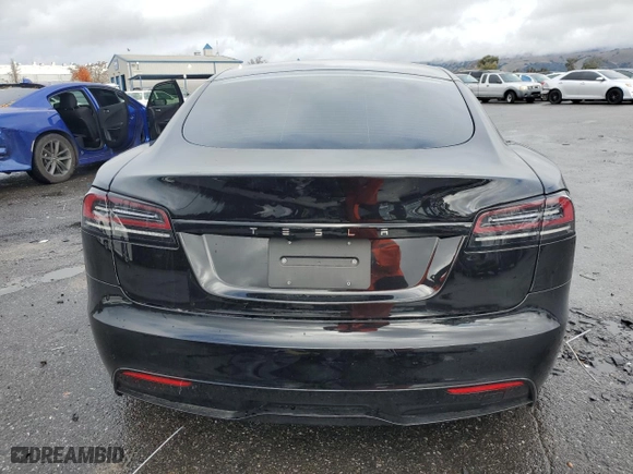 2024 Tesla Model S with VIN 5YJSA1E54RF536092, listed as a Copart auction lot 85934334 with 11,451 mi miles and Salvage Title. Bid and sale history available at carsss.com. Image 6.