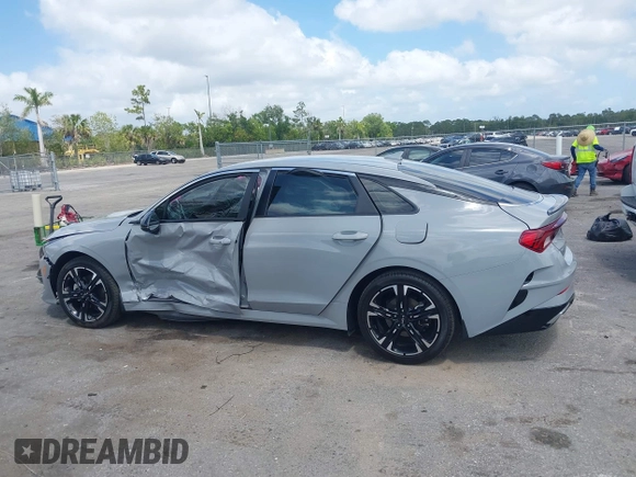 2023 Kia K5 GT-Line z VIN 5XXG64J25PG179696, wystawiony jako IAAI lot #42114587 z przebiegiem 49 192 mil mil oraz . Historia ofert i sprzedaży dostępna na DreamBid. Obrazek 14.