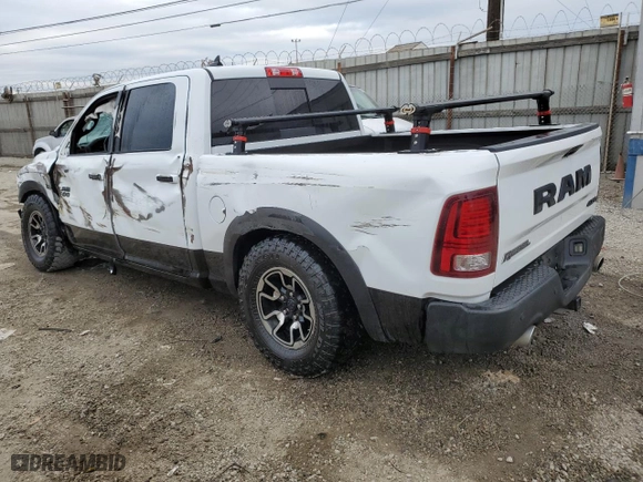 2018 Ram 1500 Rebel with VIN 1C6RR7YT7JS235965, listed as a Copart auction lot 84749674 with 61,484 mi miles and Salvage Title. Bid and sale history available at carsss.com. Image 2.