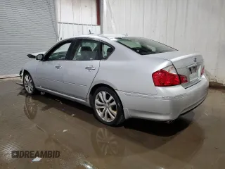2009 Infiniti M with VIN JNKCY01F39M851190, listed as a Copart auction lot 64297164 with 221,933 mi miles and Salvage Title. Bid and sale history available at DreamBid. Image 2.