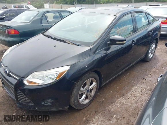 2013 Ford Focus SE z VIN 1FADP3F27DL183754, wystawiony jako IAAI lot #42677654 z przebiegiem 117 966 mil mil oraz . Historia ofert i sprzedaży dostępna na DreamBid. Obrazek 2.