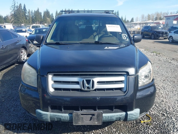 2006 Honda Pilot EX with VIN 5FNYF28466B049833, listed as a IAAI auction lot 41939721 with 238,995 mi miles and . Bid and sale history available at DreamBid. Image 12.