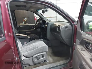 2002 GMC Envoy SLT with VIN 1GKDT13SX22426320, listed as a IAAI auction lot 41709359 with 104,418 mi miles. Bid and sale history available at carsss.com. Image 5.