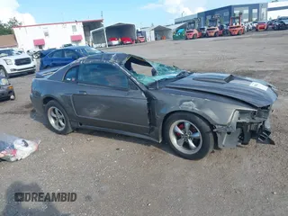 2004 Ford Mustang Standard z VIN 1FAFP40684F194867, wystawiony jako IAAI lot #39963442 z przebiegiem Nie podano mil oraz . Historia ofert i sprzedaży dostępna na DreamBid. Obrazek 13.