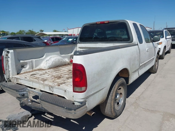 2002 Ford F-150 XL with VIN 1FTRX17232NA78925, listed as a IAAI auction lot 41851582 with 43 mi miles. Bid and sale history available at carsss.com. Image 4.
