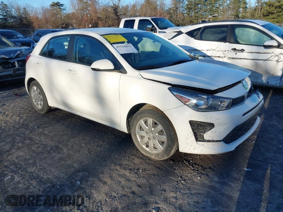 2022 Kia Rio S with VIN 3KPA25AD5NE443465, listed as a IAAI auction lot 41230852 with 20,460 mi miles and . Bid and sale history available at DreamBid. Image 1.