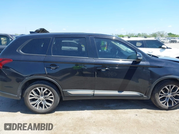 2018 Mitsubishi Outlander SE z VIN JA4AD3A32JZ067046, wystawiony jako IAAI lot #42098647 z przebiegiem 66 028 mil mil oraz . Historia ofert i sprzedaży dostępna na DreamBid. Obrazek 13.