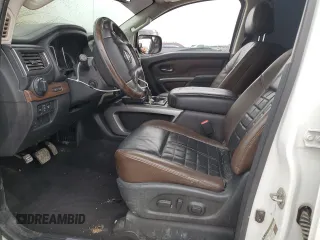 2017 Nissan Titan Platinum Reserve z VIN 1N6AA1E56HN542534, wystawiony jako Copart lot #44550645 z przebiegiem Nie podano mil oraz Szkoda całkowita • Salvage title. Historia ofert i sprzedaży dostępna na DreamBid. Obrazek 7.