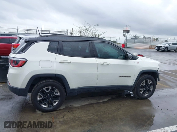 2018 Jeep Compass Trailhawk with VIN 3C4NJDDB0JT306898, listed as a IAAI auction lot 41798954 with 75,852 mi miles and . Bid and sale history available at carsss.com. Image 13.