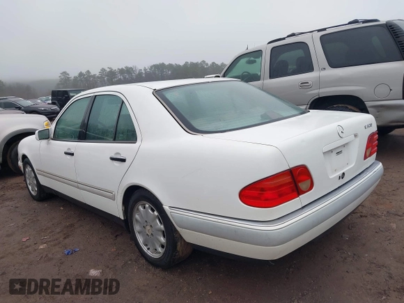 1997 Mercedes-Benz E-Class with VIN WDBJF55F4VA424262, listed as a IAAI auction lot 41462993 with 1 mi miles. Bid and sale history available at carsss.com. Image 3.
