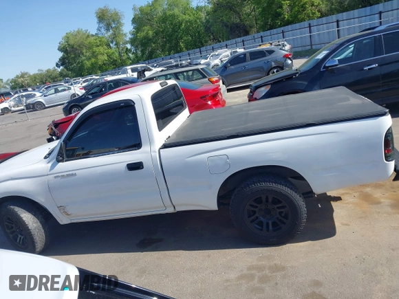 2001 Toyota Tacoma z VIN 5TENL42N61Z862007, wystawiony jako IAAI lot #42337073 z przebiegiem 256 736 mil mil oraz . Historia ofert i sprzedaży dostępna na DreamBid. Obrazek 14.