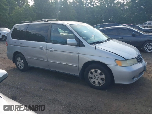 2003 Honda Odyssey EX-L with VIN 5FNRL18913B061340, listed as a IAAI auction lot 42633790 with 1,281,195 mi miles and . Bid and sale history available at DreamBid. Image 12.