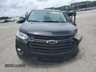 2021 Chevrolet Traverse Premier with VIN 1GNERKKW2MJ262862, listed as a Copart auction lot 58779765 with 76,927 mi miles and Salvage title. Bid and sale history available at DreamBid. Image 5.
