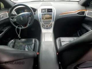 2017 Lincoln MKZ Hybrid Reserve с VIN 3LN6L5MUXHR630403, выставлен на аукционе Copart как лот 59008205 с пробегом 227 501 миль миль и Списание • Salvage title. История ставок и продаж доступна на DreamBid. Изображение 8.