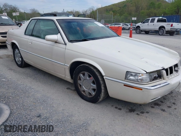 1997 Cadillac Eldorado Touring with VIN 1G6ET1293VU604921, listed as a IAAI auction lot 42113040 with 57,029 mi miles and . Bid and sale history available at DreamBid. Image 1.