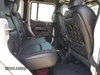 2018 Jeep Wrangler Unlimited Rubicon with VIN 1C4HJXFG9JW308991, listed as a Copart auction lot 53638955 with 95,508 mi miles and Salvage title. Bid and sale history available at DreamBid. Image 10.