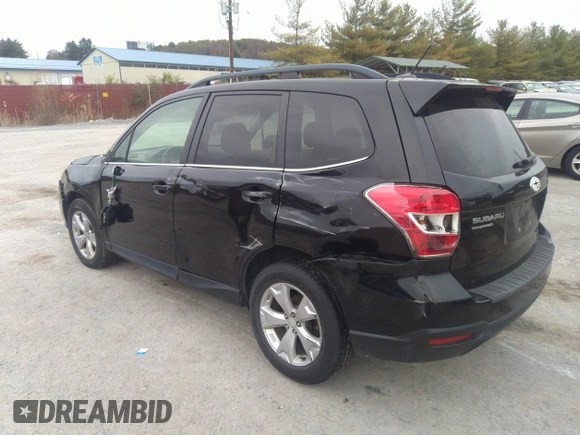 2014 Subaru Forester 2.5i Limited with VIN JF2SJAJC9EH517196, listed as a IAAI auction lot 31343919 with 71,396 mi miles. Bid and sale history available at carsss.com. Image 3.