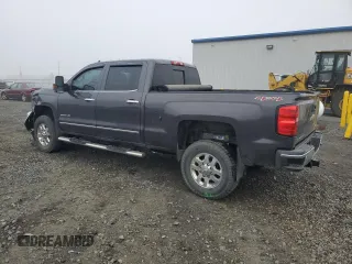 2015 Chevrolet Silverado 3500HD LTZ with VIN 1GC4K0C82FF676758, listed as a Copart auction lot 77458684 with 173,579 mi miles and Salvage Title. Bid and sale history available at DreamBid. Image 2.