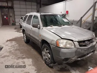 2003 Mazda Tribute DX with VIN 4F2YZ02B73KM43813, listed as a IAAI auction lot 41575708 with 202,214 mi miles and . Bid and sale history available at carsss.com. Image 1.
