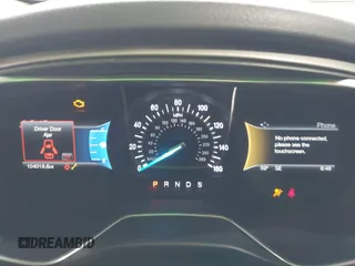 2016 Ford Fusion SE with VIN 3FA6P0H71GR386404, listed as a IAAI auction lot 41974062 with 104,018 mi miles. Bid and sale history available at carsss.com. Image 7.
