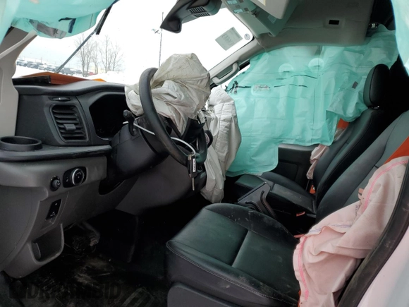 2023 Ford Transit Cargo with VIN 1FTBR2X84PKB44056, listed as a Copart auction lot 40418174 with Not Provided miles and Salvage Title. Bid and sale history available at DreamBid. Image 7.