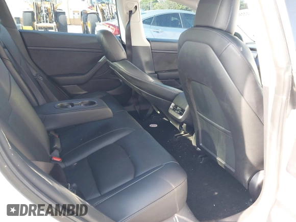 2020 Tesla Model 3 Standard Range Plus with VIN 5YJ3E1EA6LF799620, listed as a IAAI auction lot 42221643 with 55,458 mi miles and . Bid and sale history available at carsss.com. Image 8.