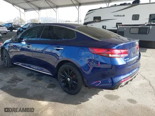 2018 Kia Optima SX with VIN 5XXGV4L29JG208284, listed as a IAAI auction lot 41765005 with 77,189 mi miles. Bid and sale history available at carsss.com. Image 3.