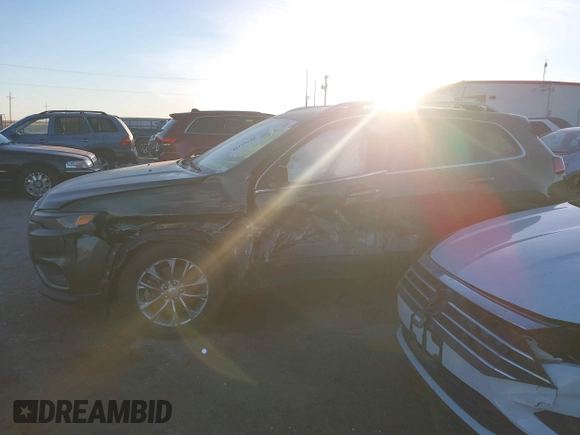 2019 Jeep Cherokee Latitude Plus with VIN 1C4PJLLN0KD164168, listed as a IAAI auction lot 41197248 with 118,278 mi miles and . Bid and sale history available at DreamBid. Image 14.