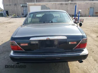 1996 Jaguar XJ with VIN SAJKX6747TC764559, listed as a Copart auction lot 48501775 with Not provided miles and Salvage title. Bid and sale history available at DreamBid. Image 6.