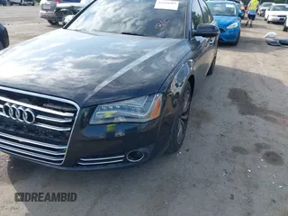2012 Audi A8 with VIN WAUAVAFD8CN029546, listed as a IAAI auction lot 42216382 with 144,989 mi miles and . Bid and sale history available at DreamBid. Image 6.