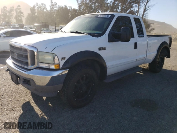 2002 Ford F-250 XL with VIN 1FTNX20L32ED10043, listed as a Copart auction lot 82608574 with 150,324 mi miles and Salvage title. Bid and sale history available at DreamBid. Image 1.