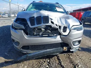 2019 Jeep Cherokee Latitude Plus with VIN 1C4PJMLB0KD320947, listed as a IAAI auction lot 41225801 with 64,537 mi miles and . Bid and sale history available at DreamBid. Image 6.