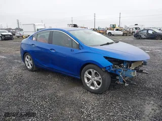 2016 Chevrolet Cruze Premier with VIN 3G1BG5SM1GS600104, listed as a IAAI auction lot 41311900 with 64,676 mi miles. Bid and sale history available at carsss.com. Image 1.
