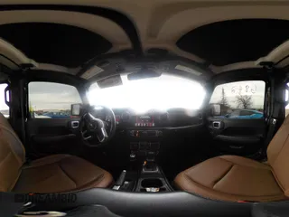 2022 Jeep Gladiator Rubicon with VIN 1C6JJTBG7NL145501, listed as a IAAI auction lot 41506842 with 20,593 mi miles and . Bid and sale history available at DreamBid. Image 21.