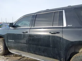 2015 GMC Yukon XL SLT with VIN 1GKS2HKC6FR257133, listed as a IAAI auction lot 41385913 with 150,238 mi miles. Bid and sale history available at carsss.com. Image 14.