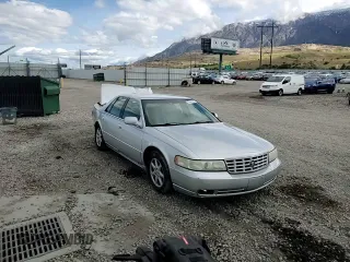 2003 Cadillac Seville Luxury SLS z VIN 1G6KS54Y53U262581, wystawiony jako Copart lot #55597595 z przebiegiem 80 832 mil mil oraz Szkoda całkowita • Salvage title. Historia ofert i sprzedaży dostępna na DreamBid. Obrazek 14.