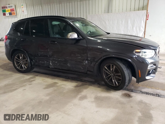 2019 BMW X3 M40i with VIN 5UXTS3C54K0Z03897, listed as a Copart auction lot 51805765 with 73,374 mi miles and Salvage Title. Bid and sale history available at DreamBid. Image 4.