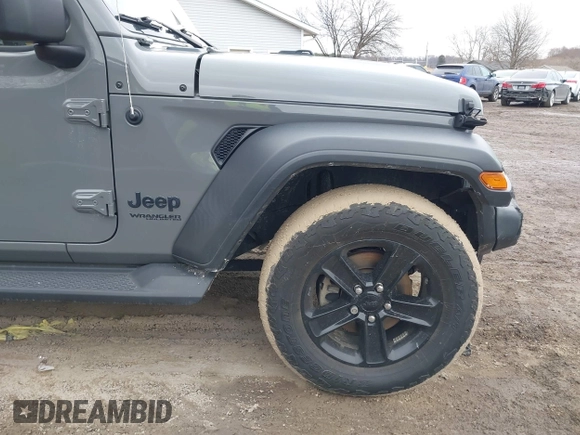 2021 Jeep Wrangler Unlimited Sport Altitude with VIN 1C4HJXDG1MW603784, listed as a IAAI auction lot 41509231 with 102,567 mi miles and . Bid and sale history available at DreamBid. Image 18.