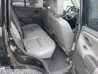 2004 Chevrolet Tracker ZR2 with VIN 2CNBJ734646907924, listed as a IAAI auction lot 42088809 with 98,797 mi miles and . Bid and sale history available at DreamBid. Image 8.
