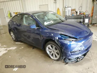2024 Tesla Model Y Long Range с VIN 7SAYGDEE8RA270862, выставлен на аукционе Copart как лот 58099875 с пробегом 24 856 миль миль и На запчасти • Non repairable. История ставок и продаж доступна на DreamBid. Изображение 4.